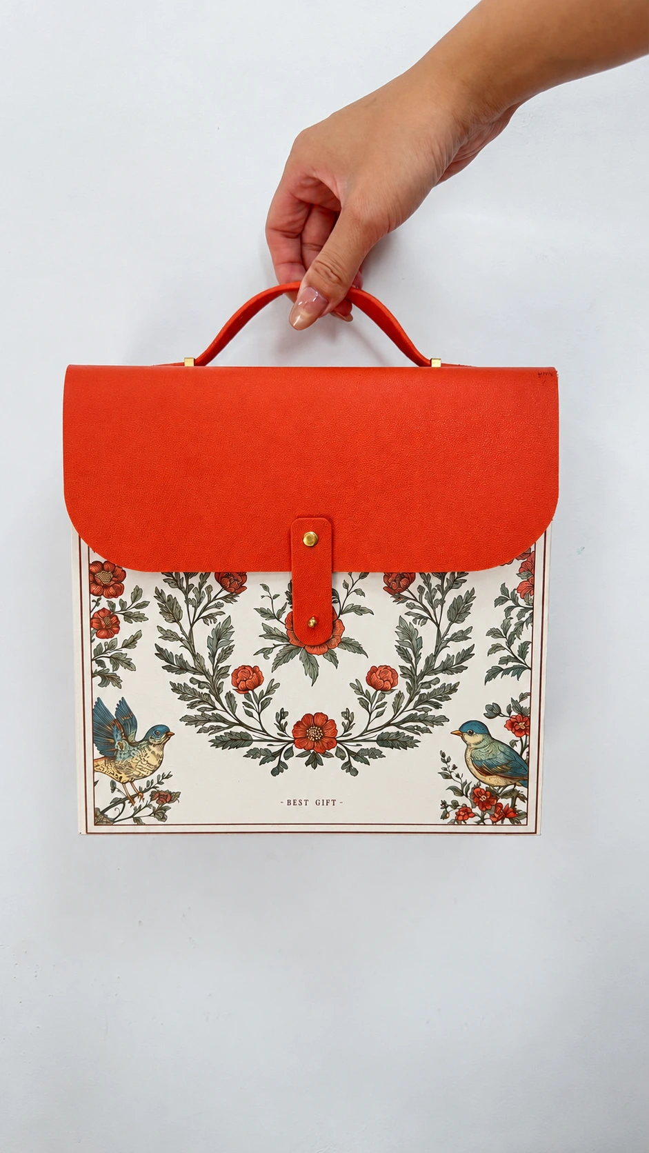 Floral gift box with orange-red kraft paper handle and flap