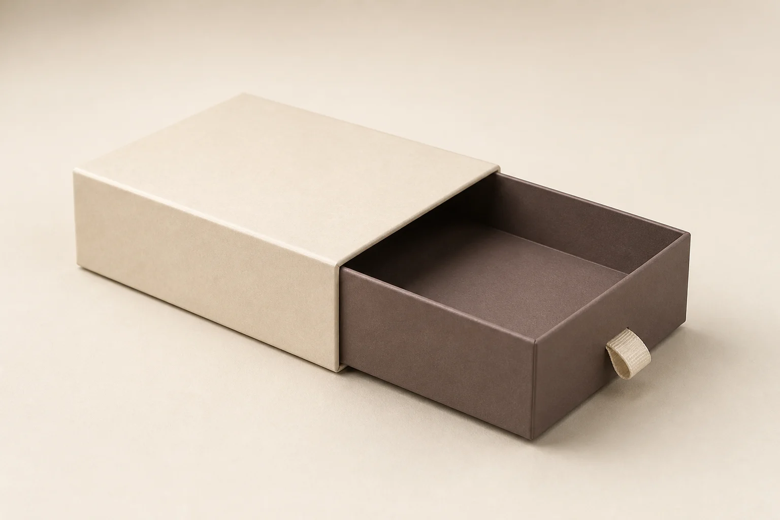 Cream sleeve box with cocoa drawer and ribbon pull