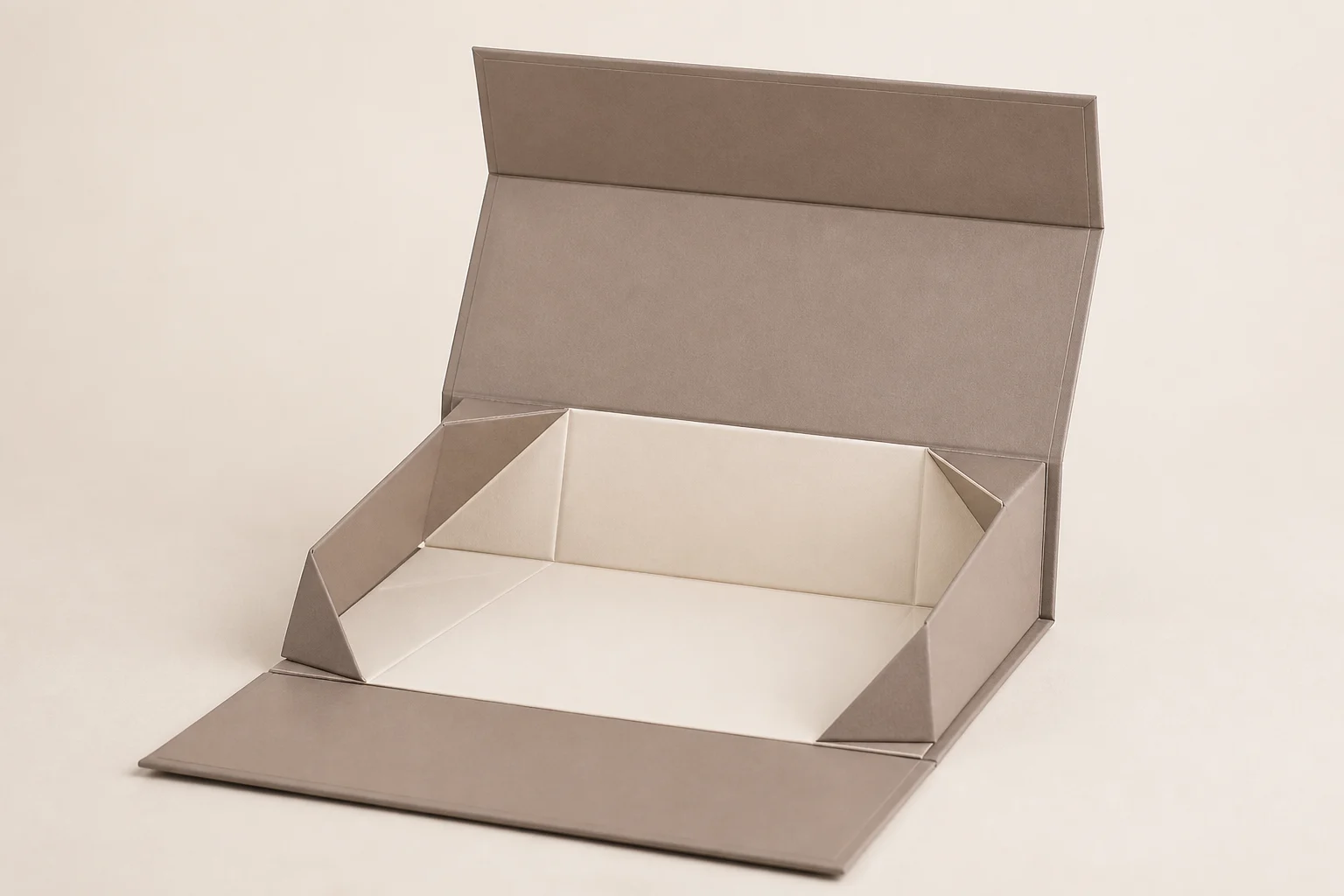 Taupe foldable gift box partly opened to show collapsible side panels
