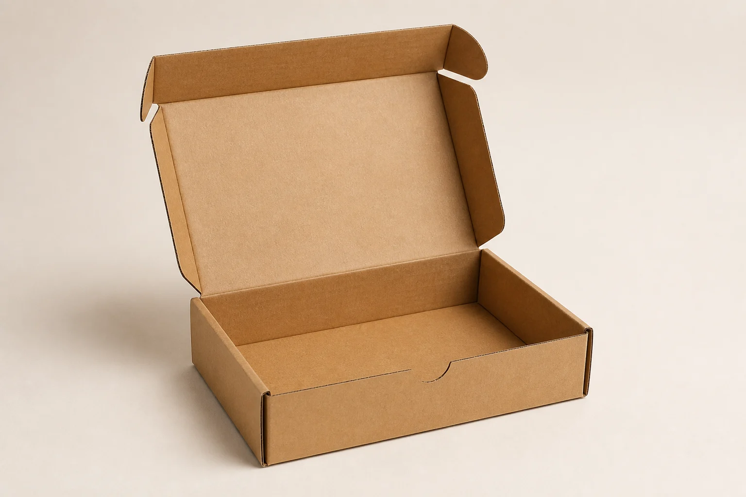 Open kraft corrugated mailer box with tuck-in lid